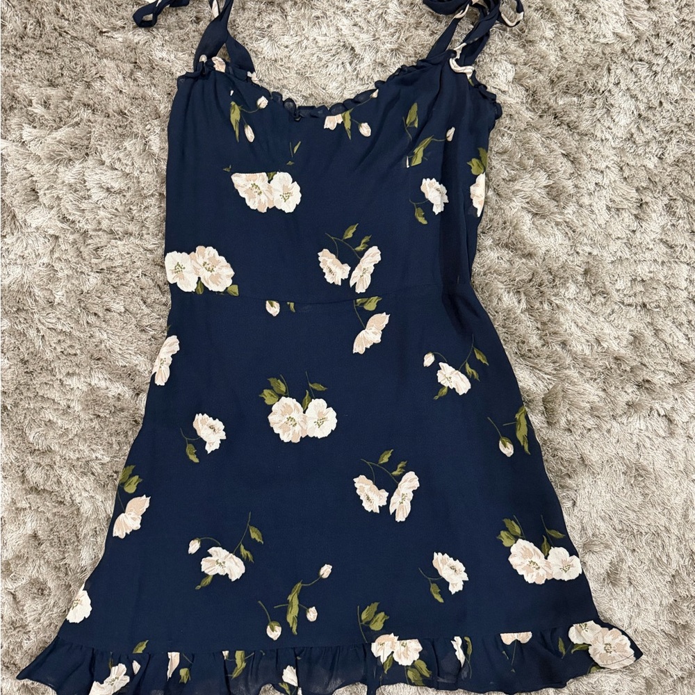 Reformation Navy Floral Mini Dress with white flowers. Picture shown for style. - Picture 4 of 5